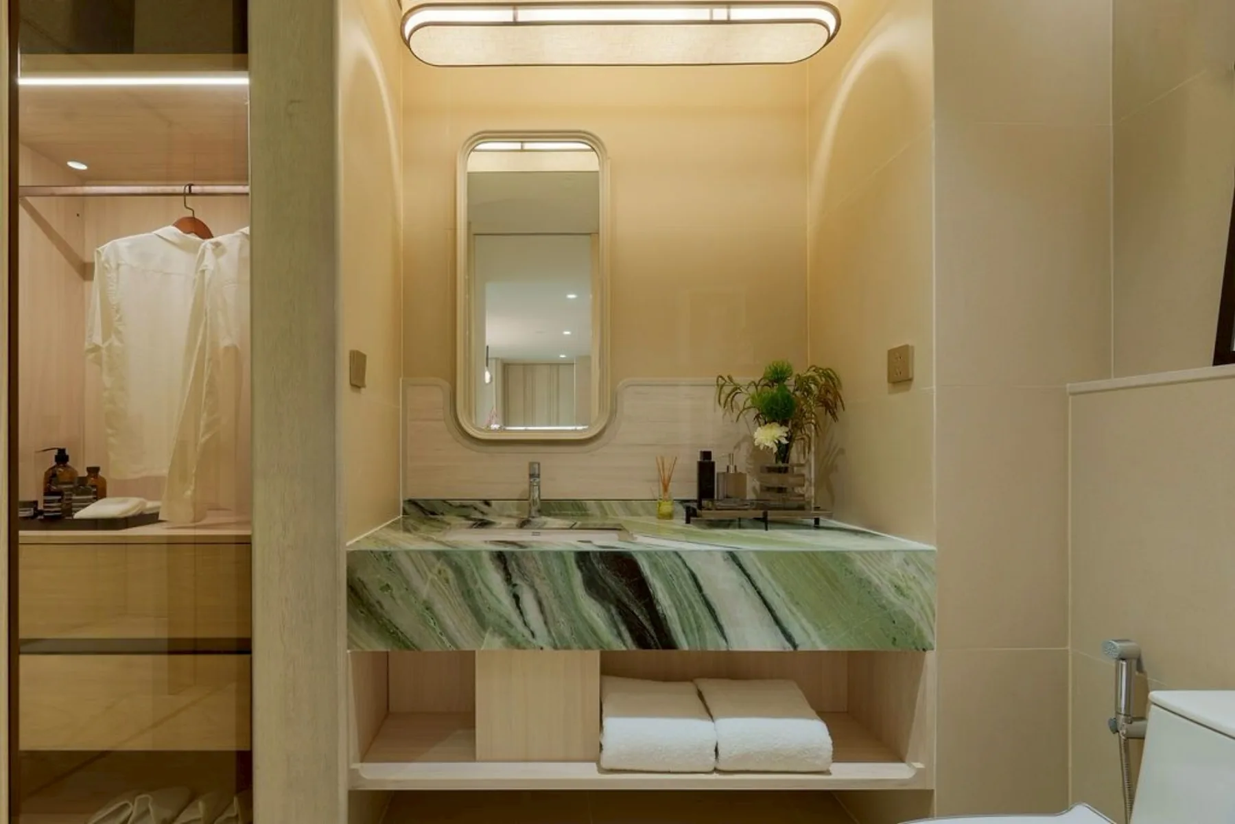 2-bedroom show suite, 100 m² — photographed on site · 2/13
